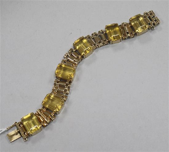 A 1950s 9ct gold and emerald cut citrine set bracelet, 18.7cm approx.